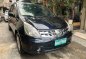 Sell Black 2011 Nissan Grand Livina in Pasay-0