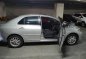 Brightsilver Toyota Vios 2010 for sale in Quezon-4