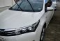 Pearl White Toyota Corolla altis 2014 for sale in Quezon City-1