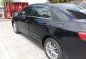 Black Toyota Corolla Altis 2010 for sale in Manual-2