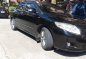 Black Toyota Corolla Altis 2010 for sale in Manual-8