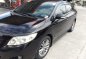 Black Toyota Corolla Altis 2010 for sale in Manual-1