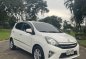 Pearl White Toyota Wigo 2014 for sale in Quezon City-6