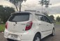 Pearl White Toyota Wigo 2014 for sale in Quezon City-5