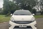 Pearl White Toyota Wigo 2014 for sale in Quezon City-3