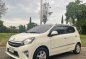 Pearl White Toyota Wigo 2014 for sale in Quezon City-1