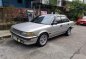 Selling Pearl White Toyota Corolla 1990 in Quezon-0