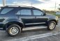 Black Toyota Fortuner 2013 for sale in Bustos-1