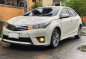 Sell Pearl White 2014 Toyota Corolla Altis -2