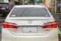 Sell Pearl White 2014 Toyota Corolla Altis -3