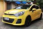Yellow Kia Rio 2015 for sale in Pateros-2