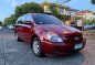 Red Kia Carnival 2.5 (A) 2009-2