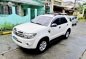 Pearl White Toyota Fortuner 2009 for sale in Cabuyao-0