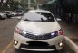 Selling Pearl White Toyota Corolla Altis 2015 in Bulacan-1