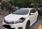 Selling Pearl White Toyota Corolla Altis 2015 in Bulacan-0