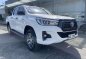 Pearl White Toyota Hilux 2018 for sale in Pasig-5