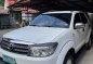 Pearl White Toyota Fortuner 2010 for sale in Lucena-0