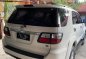 Pearl White Toyota Fortuner 2010 for sale in Lucena-6
