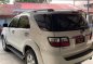 Pearl White Toyota Fortuner 2010 for sale in Lucena-5