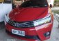 Sell Red 2014 Toyota Corolla Altis in Urdaneta-1