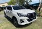 Selling White Toyota Hilux 2019 in Quezon City-2