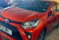 Selling Orange Toyota Wigo 2021 in Quezon-0