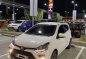 Selling White Toyota Wigo 2021 in Manila-1