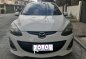 Selling White Mazda 2 2010 in Manila-9