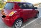 Red Suzuki Swift 2013 for sale in Lupao-1