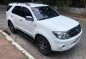 Pearl White Toyota Fortuner 2006 for sale in Quezon -1