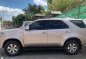 Pearl White Toyota Fortuner 2006 for sale in Balete -4