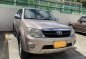 Pearl White Toyota Fortuner 2006 for sale in Balete -2