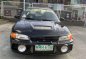 Selling Black Mitsubishi Lancer 1996 in Quezon-4