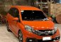 Orange Honda Mobilio 2015 for sale in Pateros-0