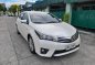 Selling Pearl White Toyota Corolla Altis 2015 in Angeles-0