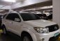 Pearl White Toyota Fortuner 2010 for sale in Makati-4