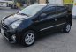 Black Toyota Wigo 2014 for sale in Manual-5