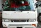 Pearl White Nissan Urvan 2013 for sale in Makati -0