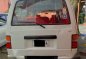 Pearl White Nissan Urvan 2013 for sale in Makati -4