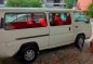 Pearl White Nissan Urvan 2013 for sale in Makati -3