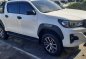 Selling White Toyota Hilux 2018 in Pozorrubio-0