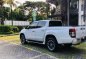 Pearl White Mitsubishi Strada 2019 for sale in Quezon -1
