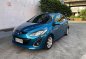 Selling Blue Mazda 2 Hatchback 2012 in Quezon City-0