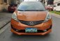 Orange Honda Jazz 2013 for sale in Quezon City-1