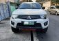Selling White Mitsubishi Strada 2011 in Quezon City-2