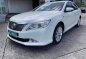 Sell Pearl White 2014 Toyota Camry in Rodriguez-0