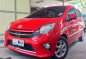 Selling Red Toyota Wigo 2016 in Quezon City-0