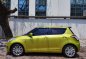 Yellow Suzuki Swift 2012 for sale in Pateros -1