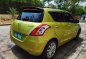 Yellow Suzuki Swift 2012 for sale in Pateros -3