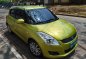 Yellow Suzuki Swift 2012 for sale in Pateros -6